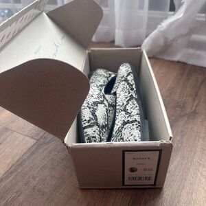 Rothy's Black and White Python Pattern Flats